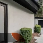 Acrylic render finish applied to exterior wall